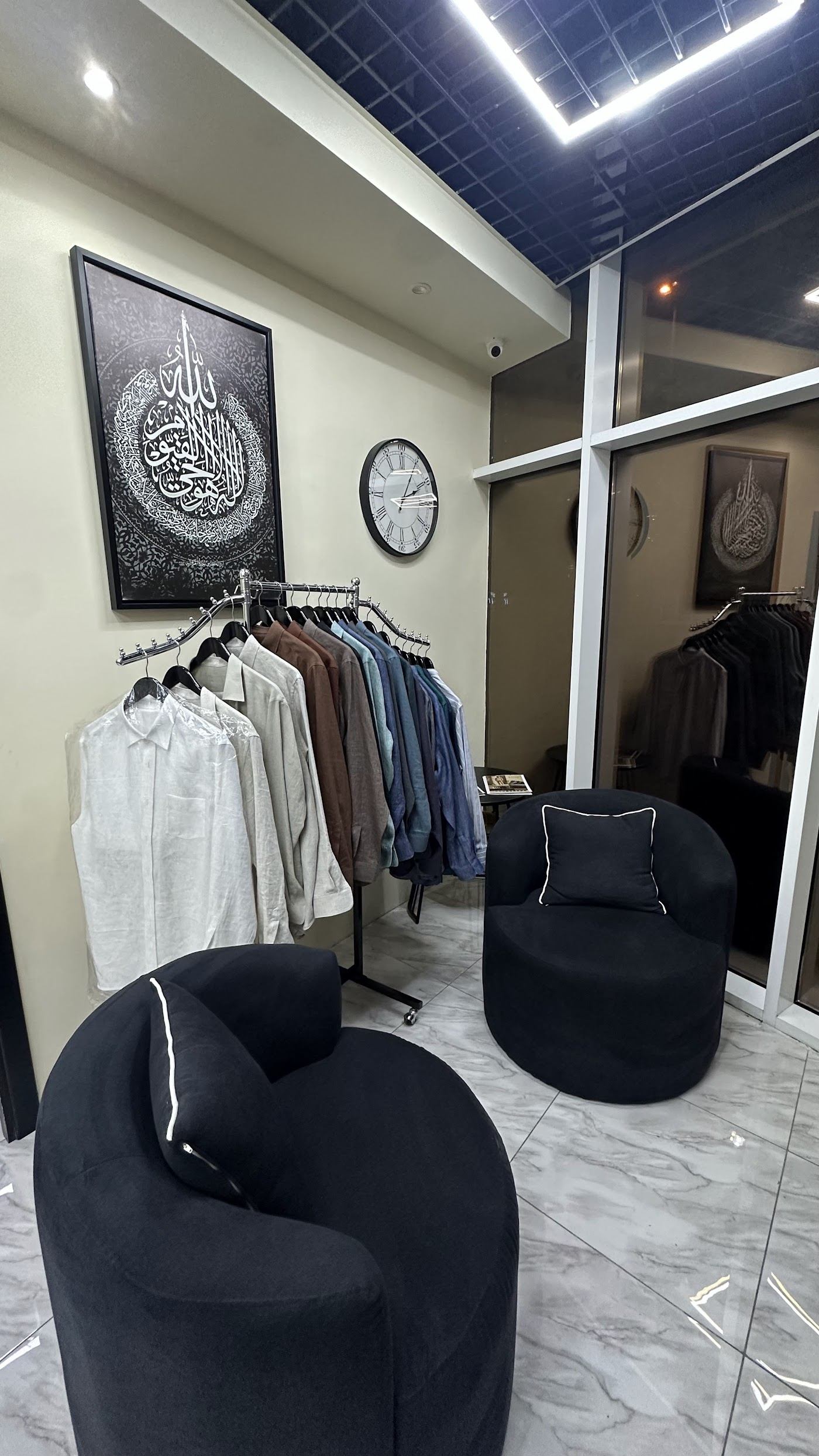The lounge and rail at Elite Tailoring, JVC