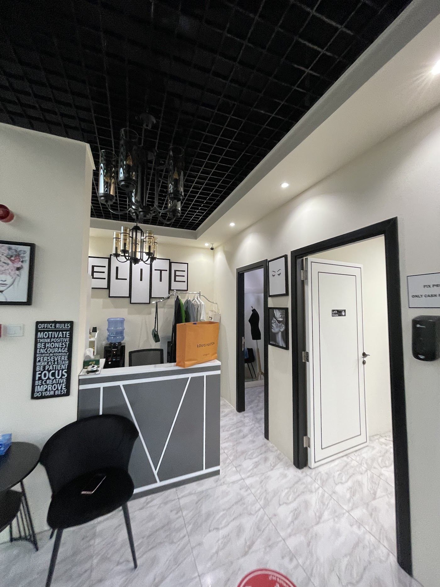 Reception and fitting area inside Elite Tailoring